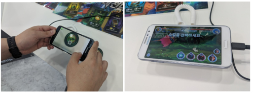 완구류 개발사 더재미가 출시한 증강현실(AR) 보드게임 ‘레전 다이노’. 레전 다이노는 보드게임과 AR 콘텐츠를 결합한 모바일 게임이다. 캐릭터 카드의 QR코드를 인식하면 새로운 캐릭터를 얻을 수 있다. / 미디어클라우드 앱